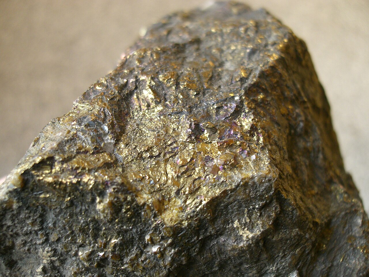 A specimen of chalcopyrite, a brassy copper-iron sulfide.