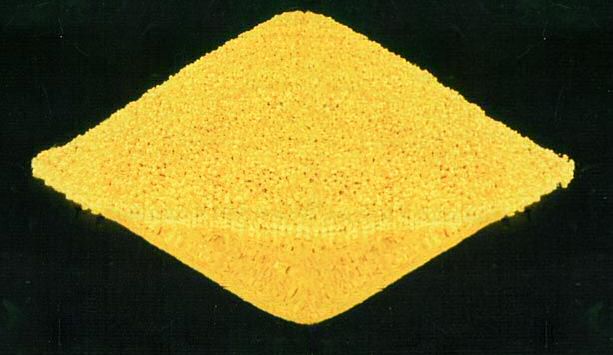 Yellowcake, a yellow uranium oxide concentrate, in a container.